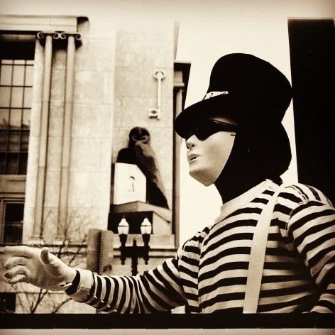 PopaDok performing the masked robotic mime character Illusion of Humanimation